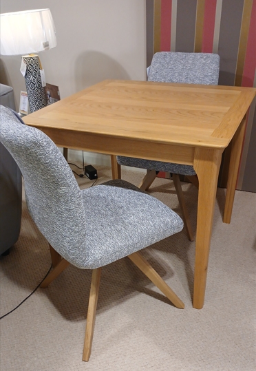 Newton Oak Finish Small Fixed Top Table with 2 x Swivel Dining Chairs